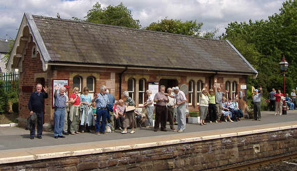 image shows members of the MBMA at a station